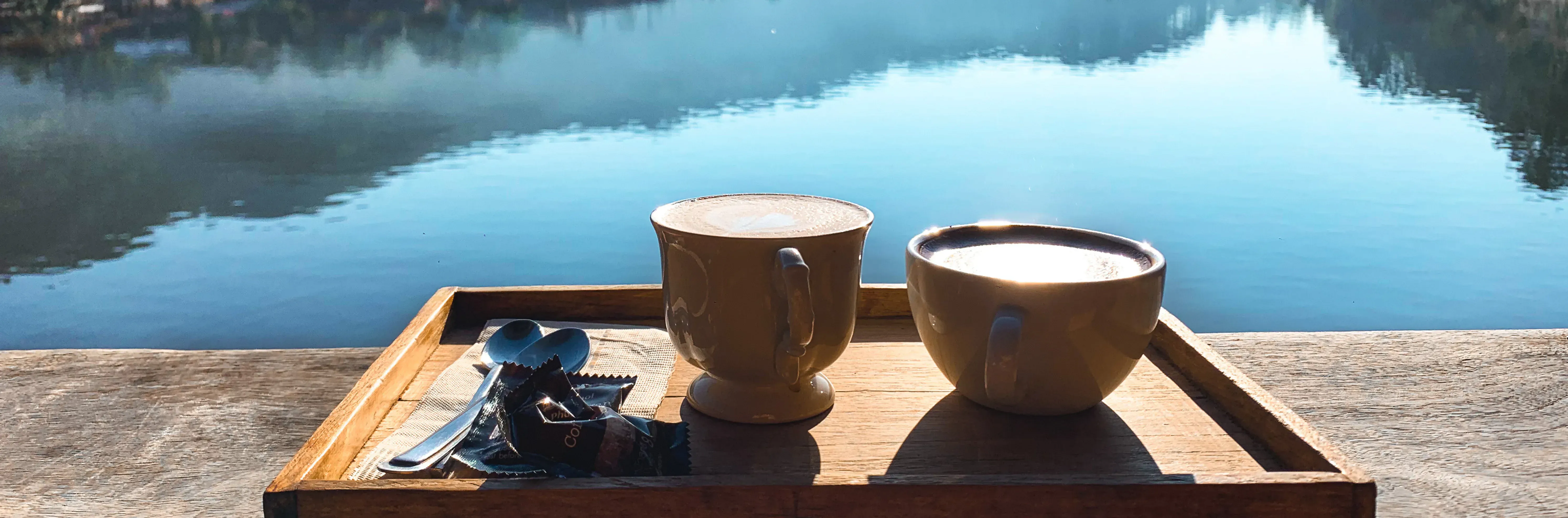 A calm, focused morning moment with a warm drink